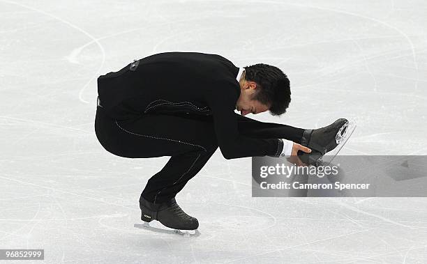 Patrick Chan of Canada competes in the men's figure skating free skating on day 7 of the Vancouver 2010 Winter Olympics at the Pacific Coliseum on...