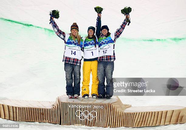 Hannah Teter of the United States celebrates winning the silver medal, Torah Bright of Australia gold and Kelly Clark of the United States bronze...