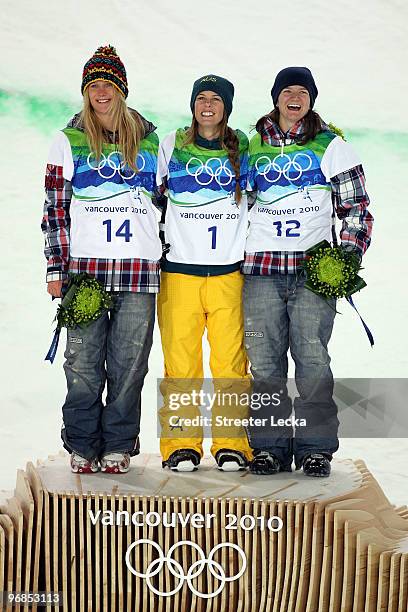 Hannah Teter of the United States celebrates winning the silver medal, Torah Bright of Australia gold and Kelly Clark of the United States bronze...