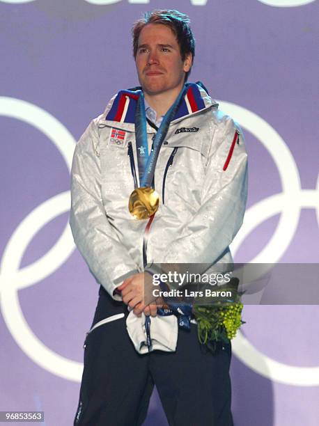 Emil Hegle Svendsen of Norway celebrates winning the gold during the medal ceremony for the Men�s 20km Individual Biathlon on day 7 of the Vancouver...