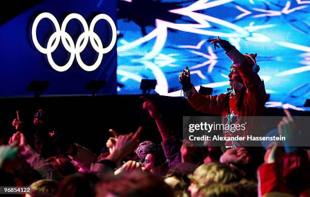 Fans cheer during the medal ceremony on day 7 of the Vancouver 2010 Winter Olympics at BC Place on February 18, 2010 in Vancouver, Canada.