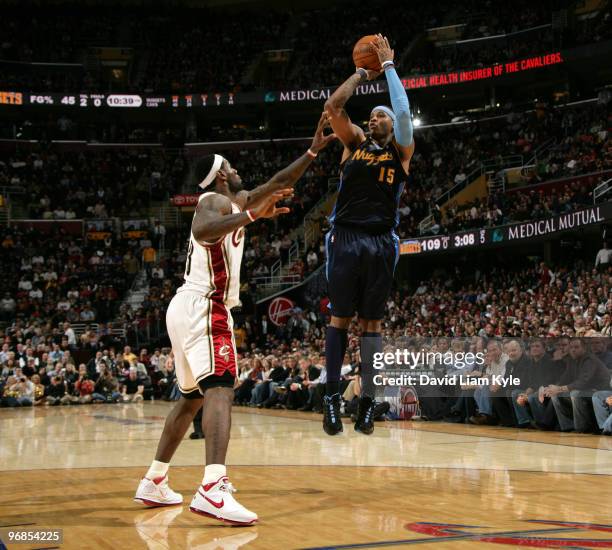 Carmelo Anthony of the Denver Nuggets shoots the jumper over LeBron James of the Cleveland Cavaliers on February 18, 2010 at The Quicken Loans Arena...