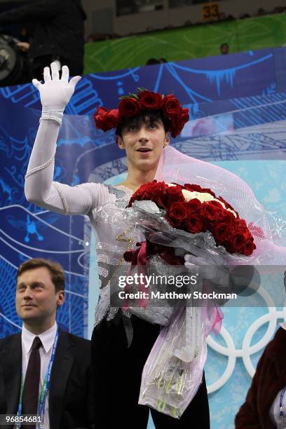 Johnny Weir of the United States waves in the kiss and cry area in the men's figure skating free skating on day 7 of the Vancouver 2010 Winter...