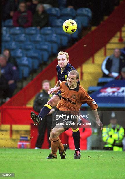 Hakan Mild of Wimbledon climbs above Wolves'' Alex Rae during the Nationwide Division One match between Wimbledon and Wolverhampton Wanderers played...