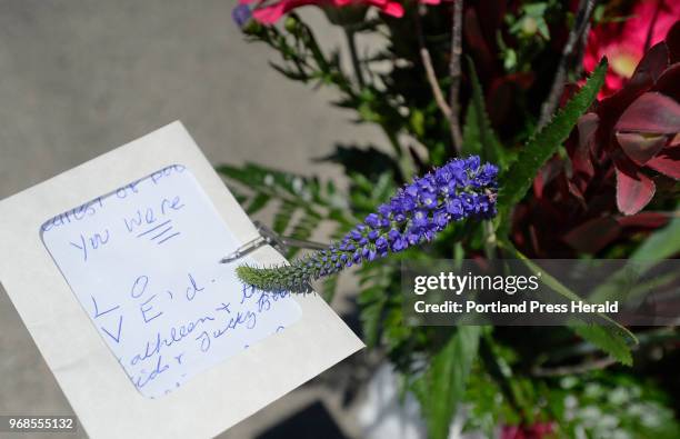 Kathleen Rogers, former publicist and friend of acclaimed artist Robert Indiana left a floral arrangement with at note at Indiana's Vinalhaven home...