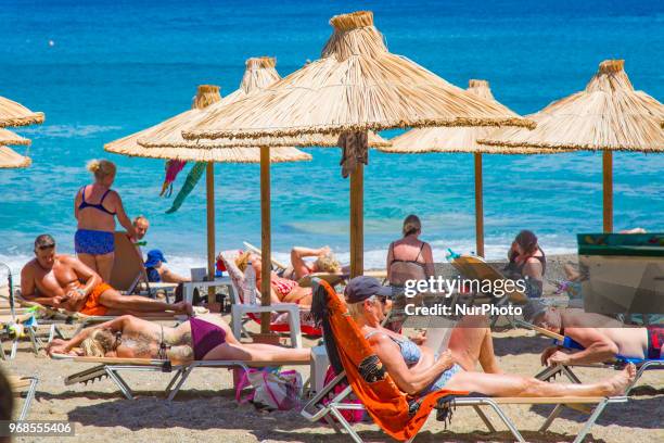 Kitroplateia Beach in Agios Nikolaos town in Crete island in Greece. This beach awarded with the Blue Flag has transparent crystal clear water in the...