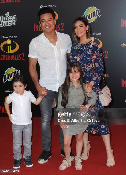 Personality Mario Lopez and wife Courtney Laine Mazza, son Dominic Lopez and daughter Gia Francesca Lopez arrive for the Premiere Of Disney And...