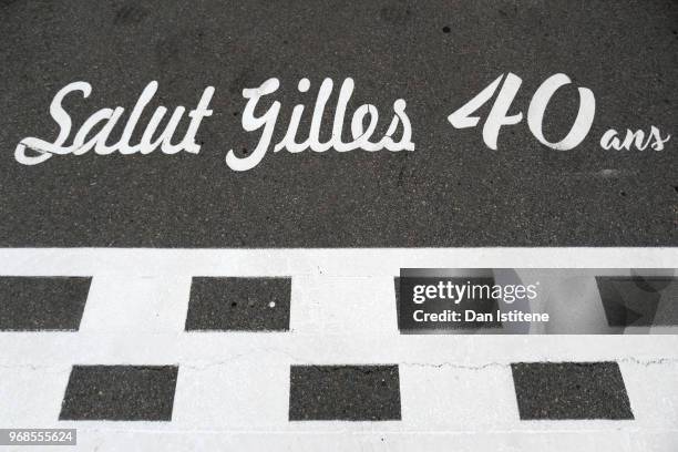 Salut Gilles 40 ans' is displayed next to the start finish line on the track to commemorate 40 years since the opening of the circuit and its first...