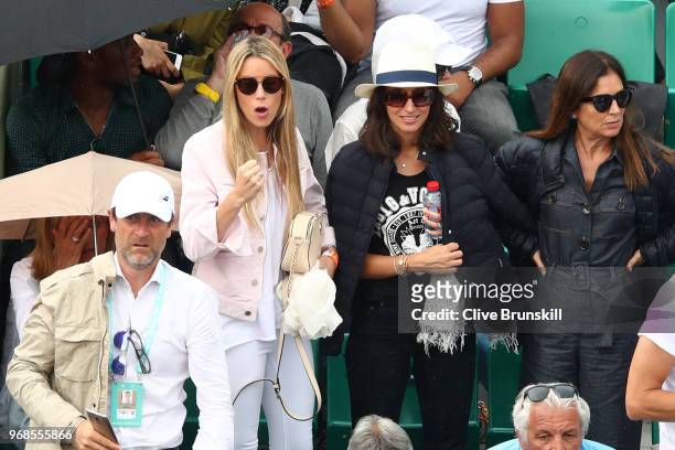 Rafael Nadal's mother Ana Maria Parera, sister, Maria Isabel Nadal and girlfriend, Xisca Perello watch on during his mens singles quarter finals...
