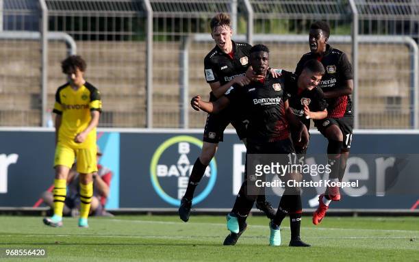 Kevin Bukusu of Leverkusen celebrates the first goal and equalises during the B Juniors German Championship Semi Final first leg match match between...