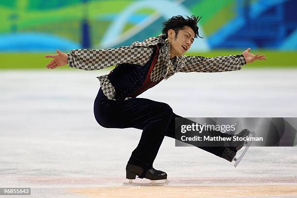 Daisuke Takahashi of Japan ompetes in the men's figure skating free skating on day 7 of the Vancouver 2010 Winter Olympics at the Pacific Coliseum on...