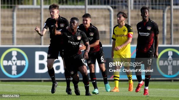 Kevin Bukusu of Leverkusen celebrates the first goal and equalizes during the B Juniors German Championship Semi Final first leg match match between...