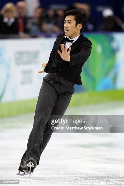 Nobunari Oda of Japan competes in the men's figure skating free skating on day 7 of the Vancouver 2010 Winter Olympics at the Pacific Coliseum on...