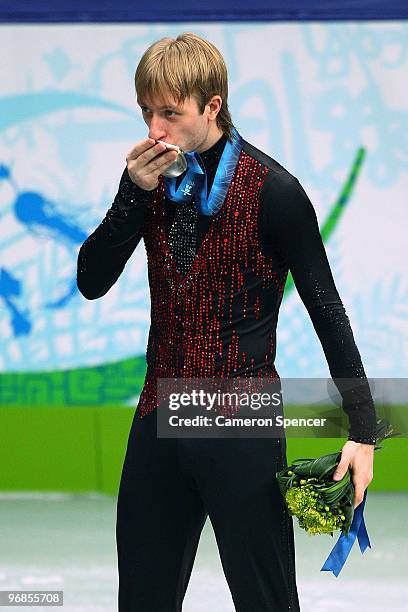 Silver medalist Evgeni Plushenko of Russia kisses his medal in the men's figure skating free skating on day 7 of the Vancouver 2010 Winter Olympics...