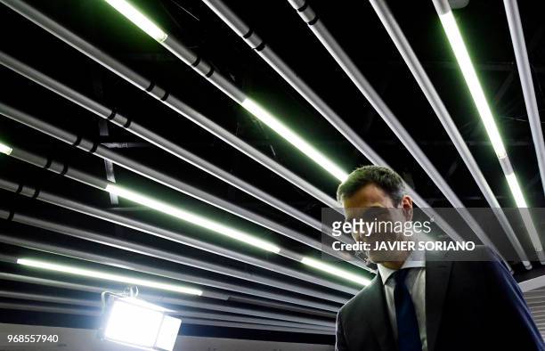 Spanish prime minister Pedro Sanchez leaves after announcing his new cabinet members at La Moncloa palace in Madrid on June 6, 2018. - The socialist...