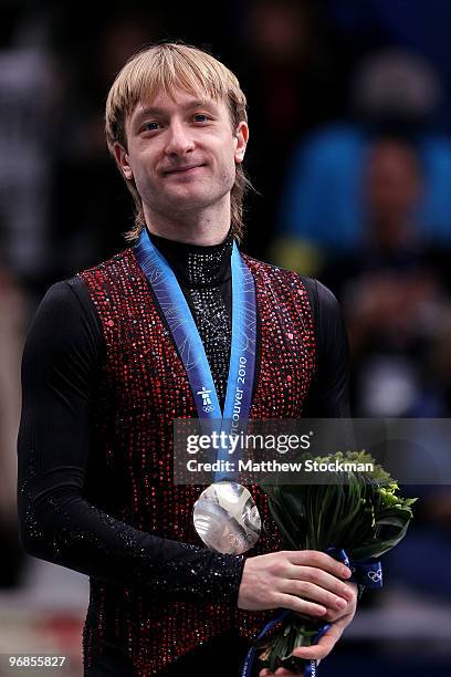 Silver medalist Evgeni Plushenko of Russia looks on in the men's figure skating free skating on day 7 of the Vancouver 2010 Winter Olympics at the...