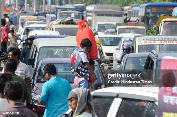 Heavy traffic jam due to a protest rally by All India Trinamool Youth Congress supporters against hike in the price of Petrol, Diesel, LPG cylinders...