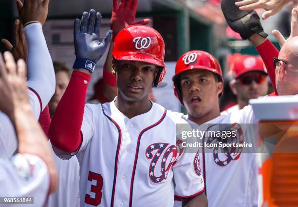 Washington Nationals center fielder Michael Taylor and right fielder Juan Soto in the dugout after scoring home runs off a single by starting pitcher...