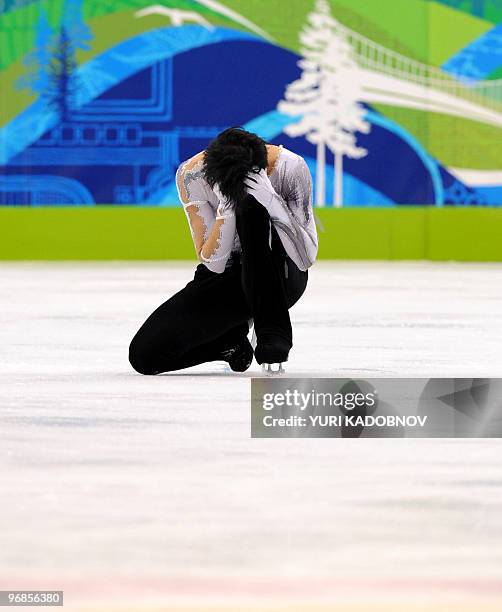 Johnny Weir performs in the Men's Figure skating free program at the Pacific Coliseum in Vancouver during the 2010 Winter Olympics on February 18,...