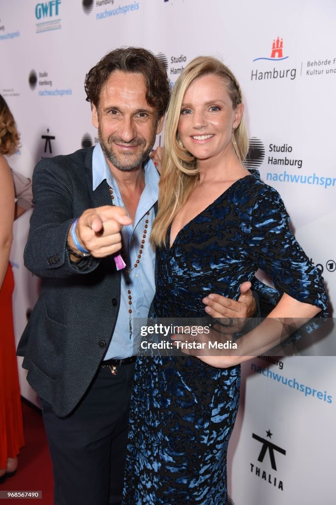 Falk Willy Wild and Kim-Sarah Brandts attend the Studio Hamburg... News