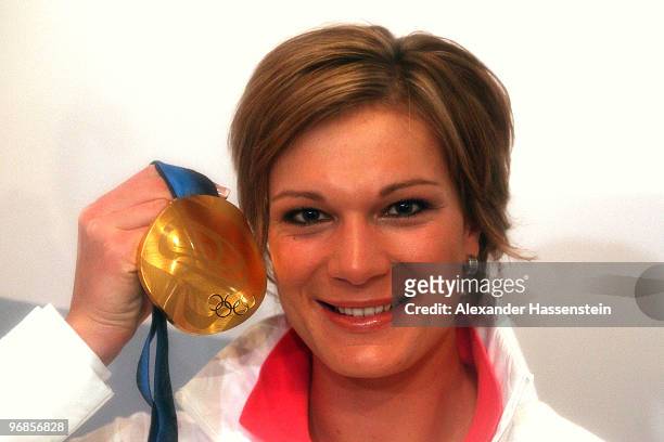 Gold medalist Maria Riesch of Germany poses with her medal for the women's Super Combined, at the German House on day 7 of the Vancouver 2010 Winter...
