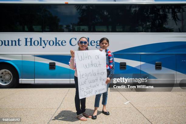 Puerto Ricans who were displaced by Hurricane Maria, arrive in buses from western Massachusetts on First St., NE, on June 6, 2018. They came to urge...