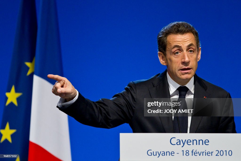 French President Nicolas Sarkozy gesture