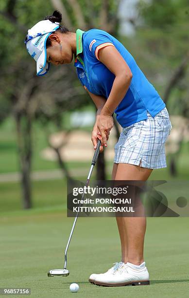 Ai Miyazato of Japan putts on the second day of the Honda-PTT LPGA Thailand 2010 golf tournament in the Thai resort of Pattaya on February 19, 2010....