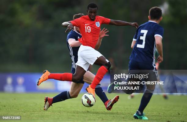 Scotland's defender Greg Taylor vies with England's forward Edward Nketiah during the Festival International Espoirs - Maurice Revello Tournament...