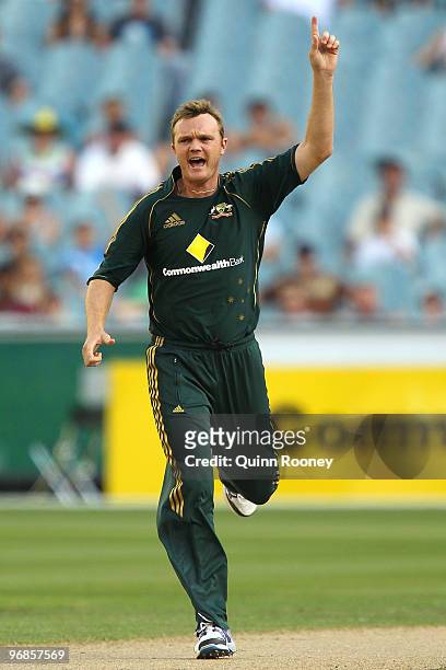 Doug Bollinger of Australia celebrates the wicket of Travis Dowlin of the West Indies during the Fifth One Day International match between Australia...