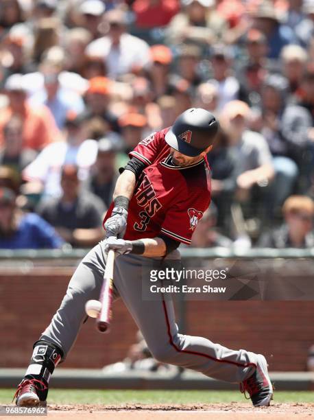 Daniel Descalso of the Arizona Diamondbacks hits a double that scored two runs in the third inning against the San Francisco Giants at AT&T Park on...