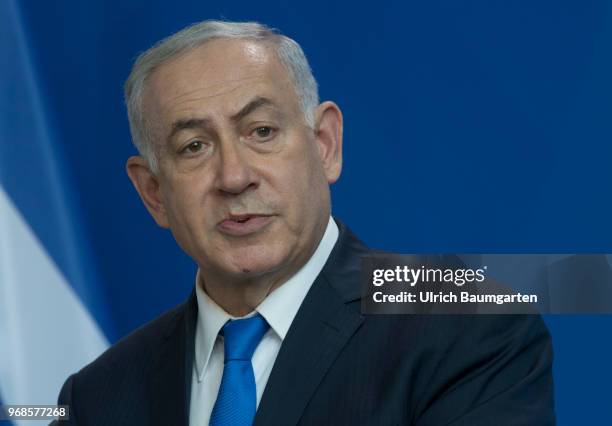 Visiting Berlin. Israeli Prime Minister Benjamin Netanjahu and Chancellor Angela Merkel in the Federal Chacellery. Netanjahu during the press...