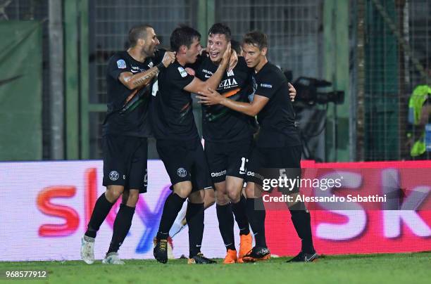 Marco Firenze of Venezia FC celebrates after scoring the 1-1 goal with team mates during the serie B playoff match between Venezia FC and US Citta di...