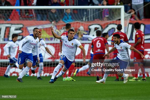 Alberto Zapater of Real Zaragoza celebrates scoring his team's first goal during the La Liga 123 play off match between CD Numancia de Soria and Real...