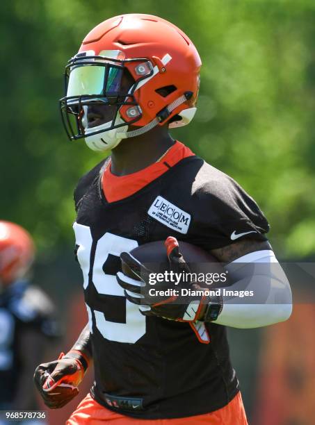 Running back Duke Johnson Jr. #29 of the Cleveland Browns carries the ball during an OTA practice at the Cleveland Browns training facility in Berea,...