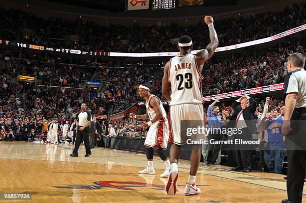 LeBron James of the Cleveland Cavaliers celebrates a basket during the game against the Denver Nuggets on February 18, 2010 at Quicken Loans Arena in...