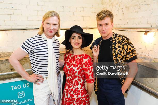 Henry Conway, Cassie Bradley and Fletcher Cowan attend the Graduate Fashion Week Gala Show 2018 at The Truman Brewery on June 6, 2018 in London,...