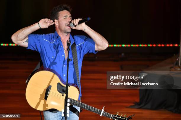 Jake Owen performs on stage at the 14th Annual Stars For Second Harvest Benefit at Ryman Auditorium on June 5, 2018 in Nashville, Tennessee.