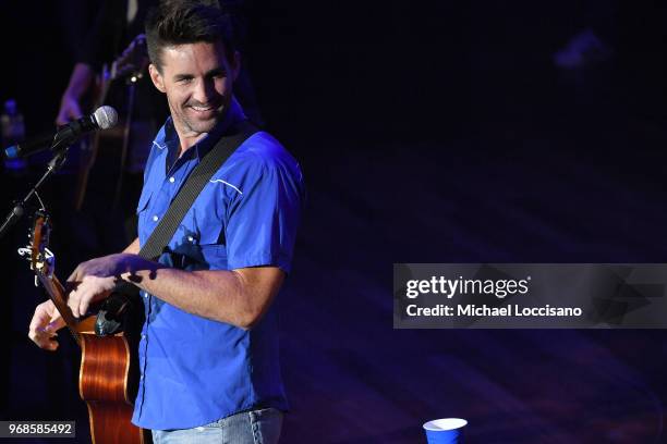 Jake Owen performs on stage at the 14th Annual Stars For Second Harvest Benefit at Ryman Auditorium on June 5, 2018 in Nashville, Tennessee.