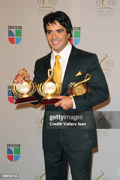 Luis Fonsi poses in the press room at Univisions 2010 Premio Lo Nuestro a La Musica Latina Awards at American Airlines Arena on February 18, 2010 in...