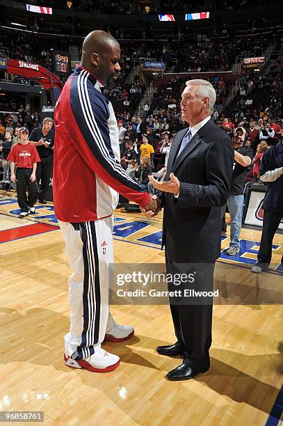 Jerry West greets Shaquille O'Neal of the Cleveland Cavaliers prior to the game against the Denver Nuggets on February 18, 2010 at Quicken Loans...