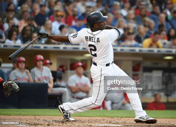 Jose Pirela of the San Diego Padres bats during a baseball game against the Cincinnati Reds at PETCO Park on June 2, 2018 in San Diego, California.