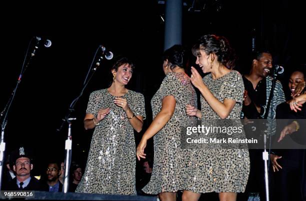 Comedian Roseanne Barr performs on stage the grand opening of the Planet Hollywood night club with Kim Sliva Washington, DC, October 3, 1993.