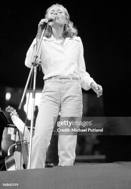 American singer-songwriter Joni Mitchell performing at Wembley Stadium, London, 1974.