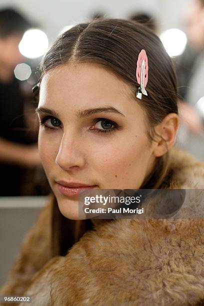 Model prepares backstage at Milly By Michelle Smith Fall 2010 during Mercedes-Benz Fashion Week at Bryant Park on February 17, 2010 in New York City.