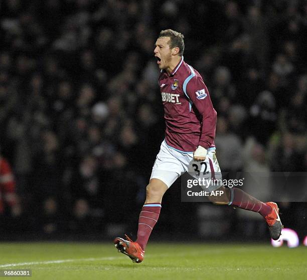 West Ham's Italian striker Alessandro Diamanti celebrates scoring the opening goal of the English Premier League football match between West Ham...