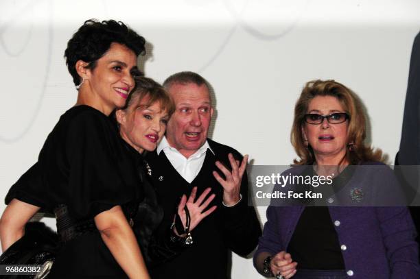 Actresses Farida Khelfa, Arielle Dombasle, Fashion Designer Jean Paul Gaultier and Actress Catherine Deneuve attend the Jean Paul Gaultier: Paris...