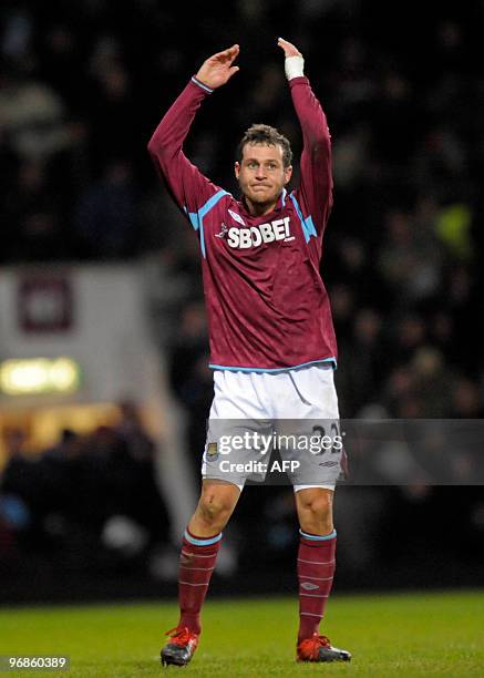 West Ham's Alessandro Diamanti celebrates scoring the opening goal of the English Premier League football match between West Ham United and...