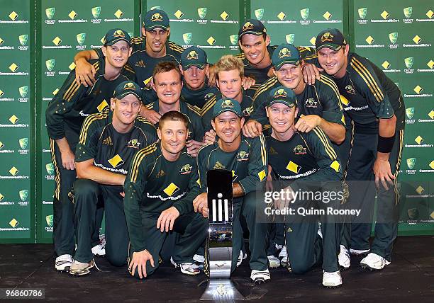 The Australian cricket team poses with the Commonwealth Bank Trophy after winning the Fifth One Day International match between Australia and the...