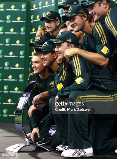 The Australian team celebrate with the Commonwealth Bank trophy after winning the Fifth One Day International match between Australia and the West...